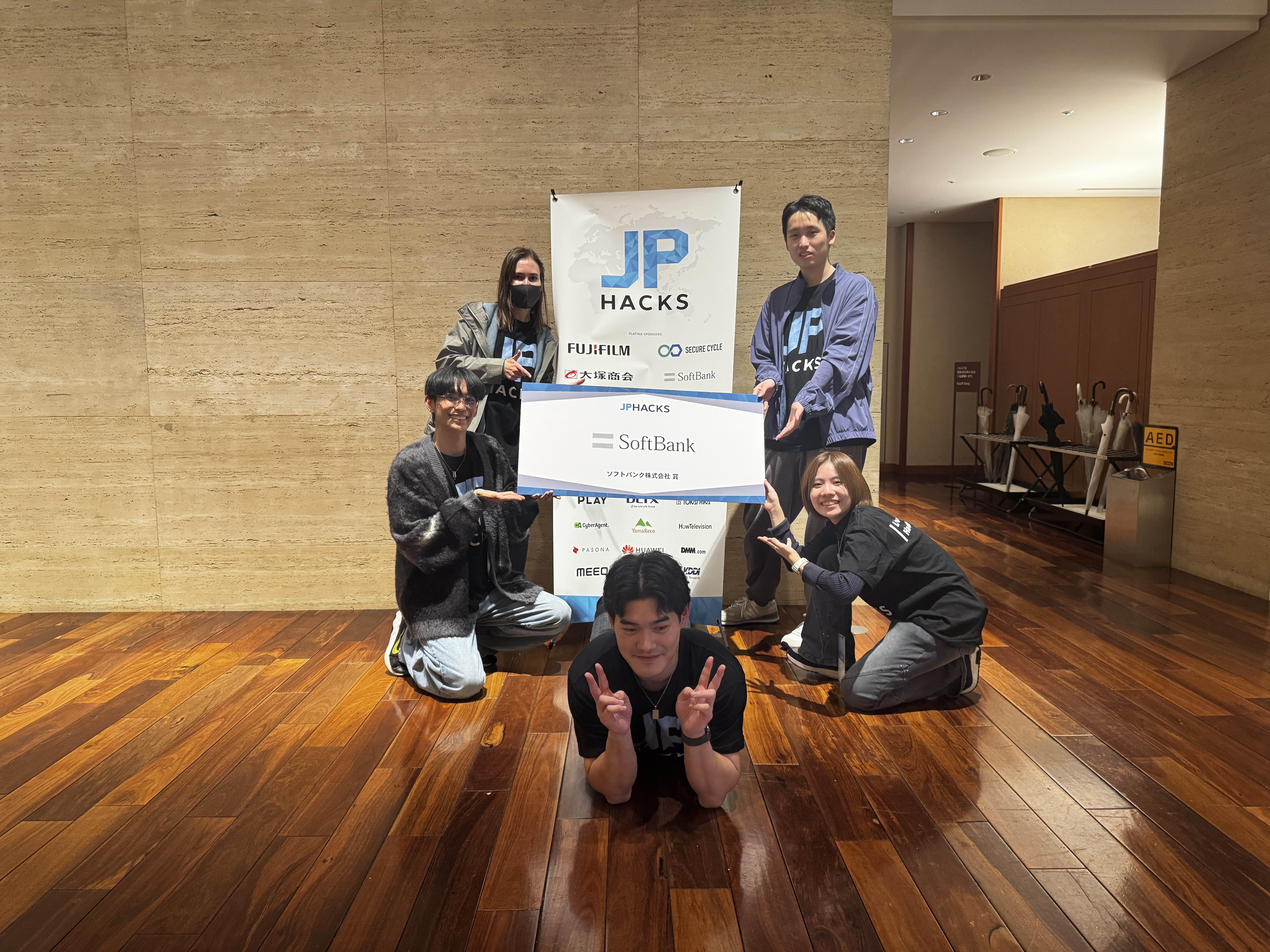 Photo: Team Photo taken during Award Day. Going from top left to top right in a U shape: Martyna, Win, June, Rio, and me